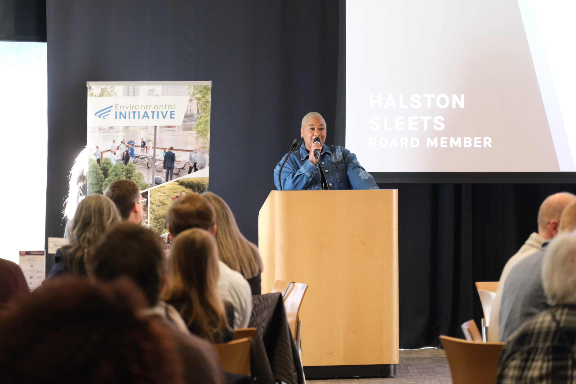 Board member Halston Sleets at the podium.