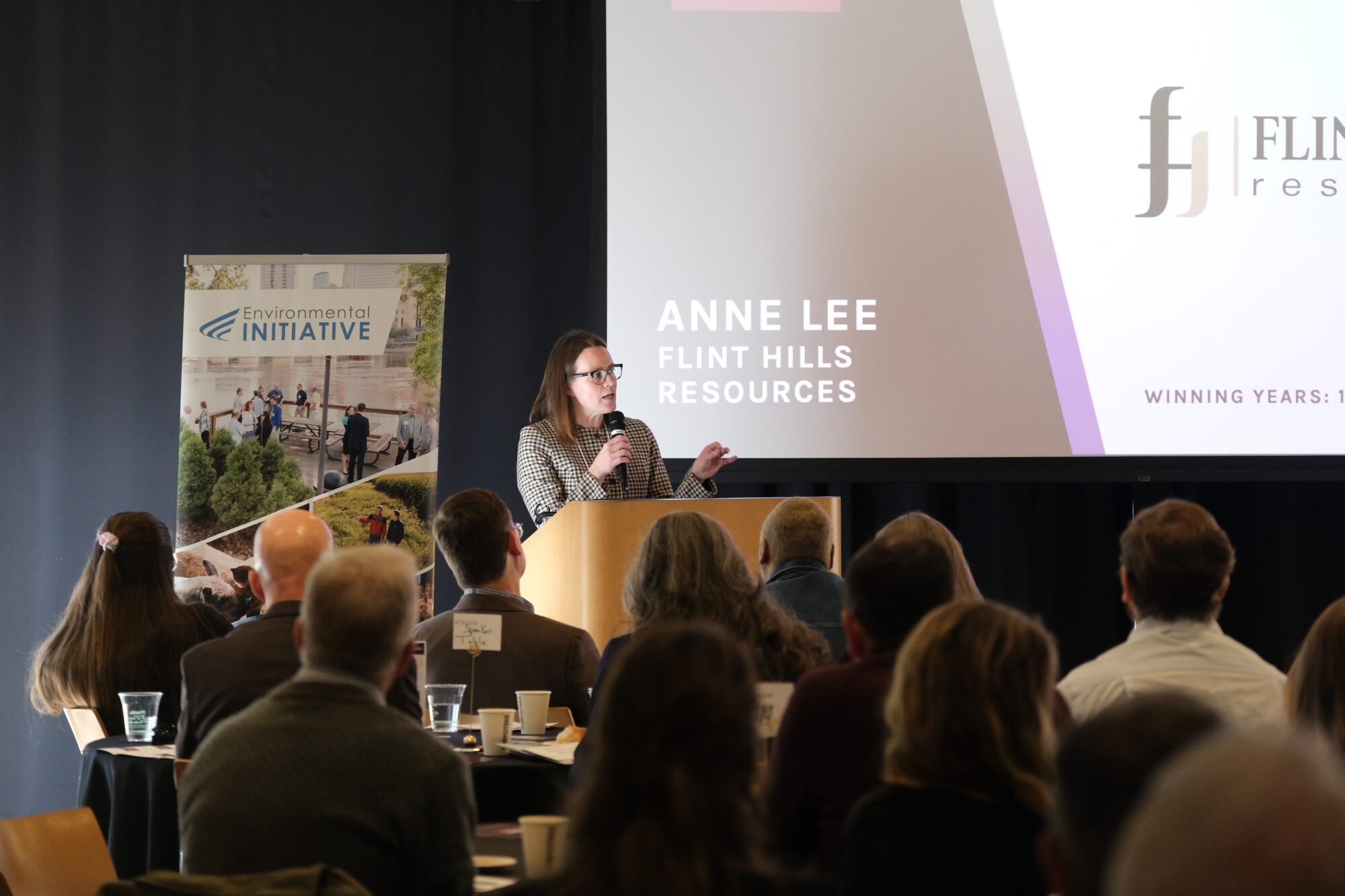 Anne Lee of Flint Hills Resources speaks at the podium.