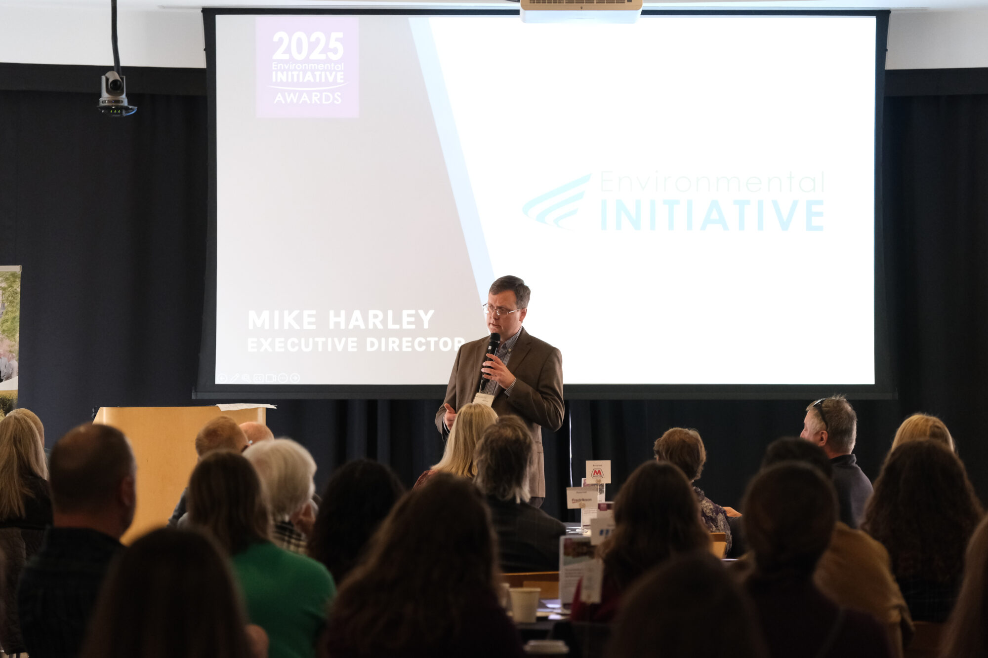 Mike Harley of Environmental Initiative speaks in front of the crowd.