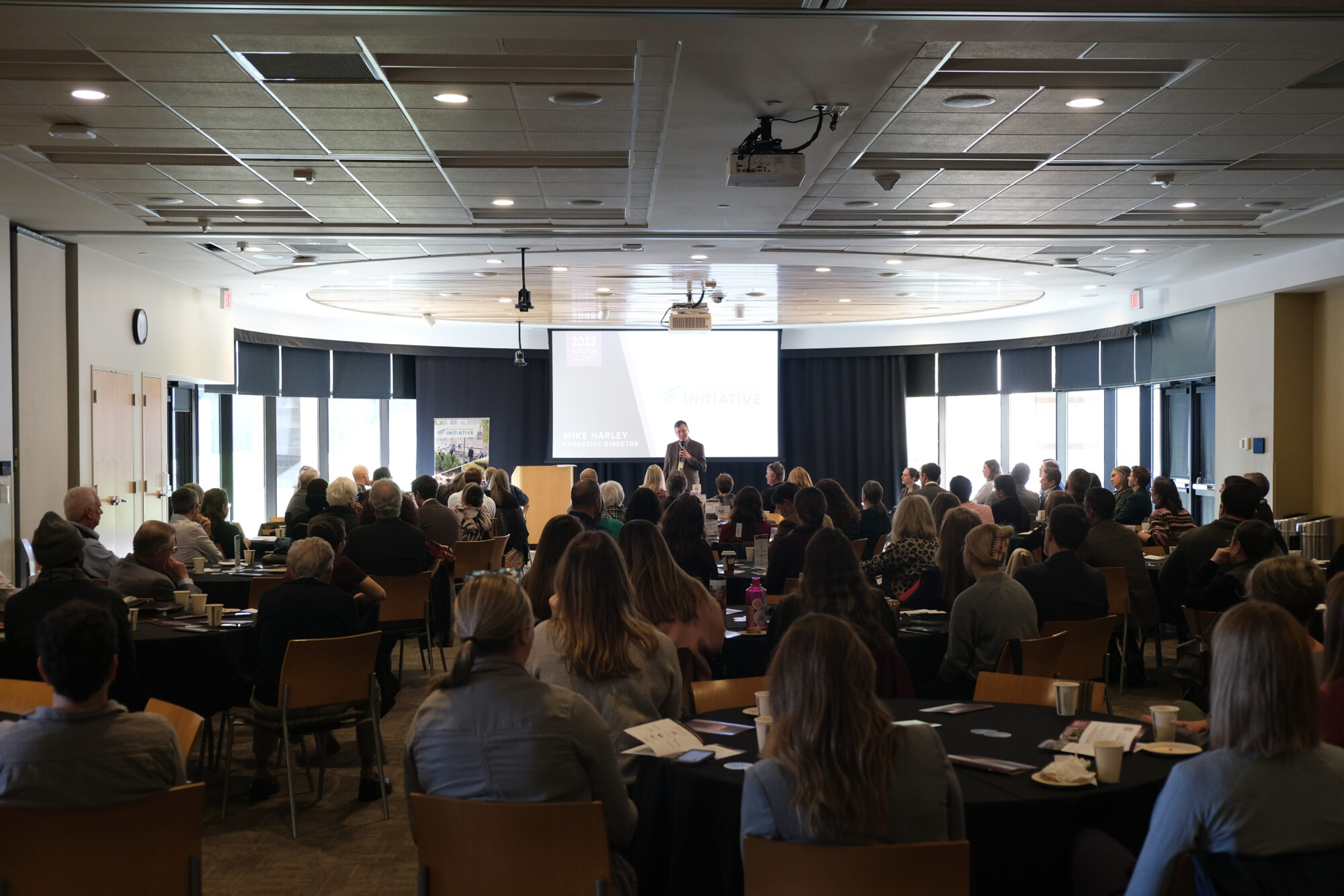 Mike Harley of Environmental Initiative speaks in front of the crowd.